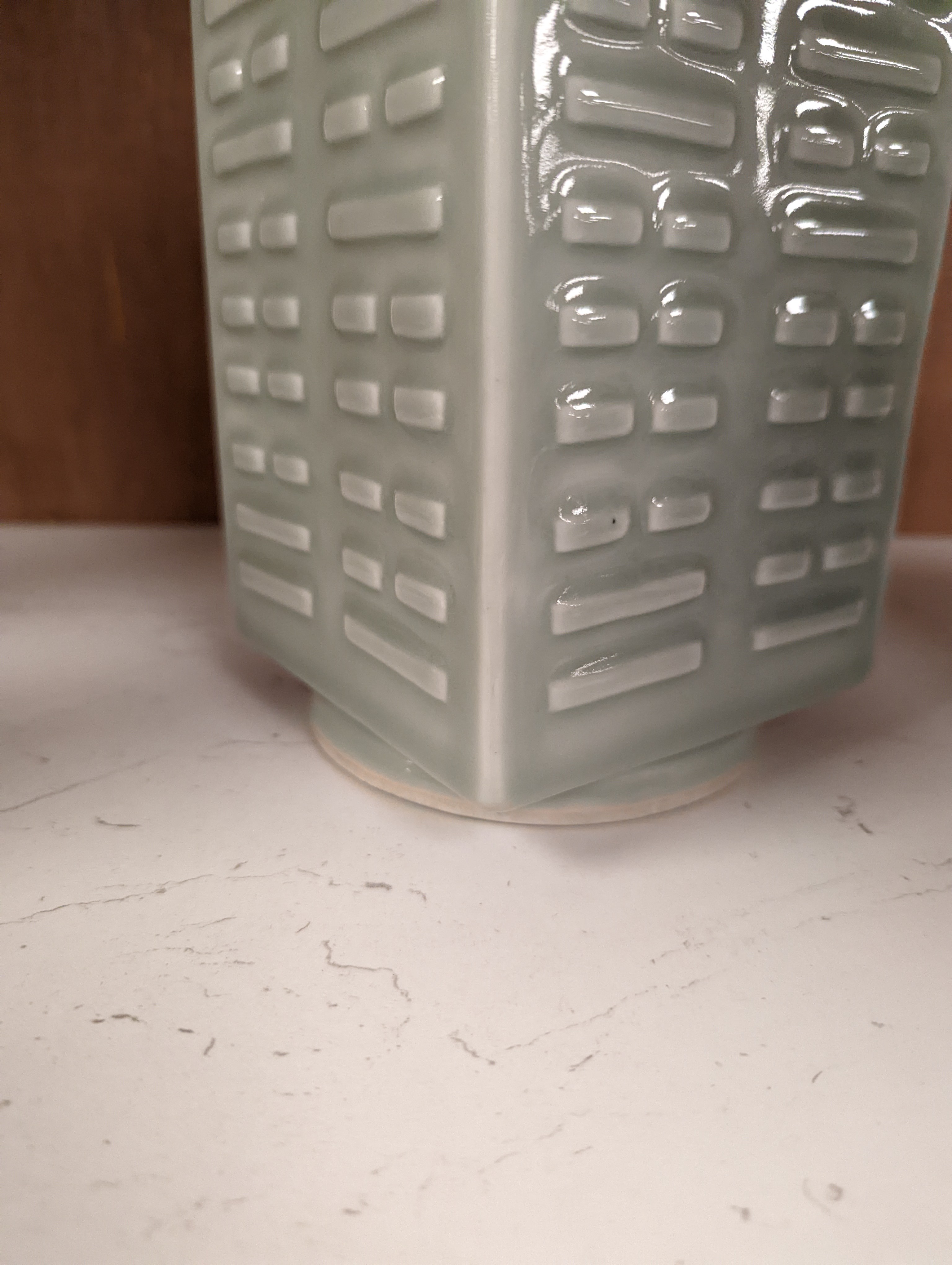 A Chinese celadon glazed eight trigrams cong shaped vase, Guangxu mark and possibly of the period. Provenance - owner bought in auction 20 years ago. 25cm tall
